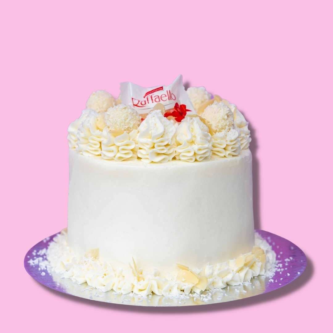 Coconut Cake with oozing Nutella - Perfect Birthday Cake with coco flakes