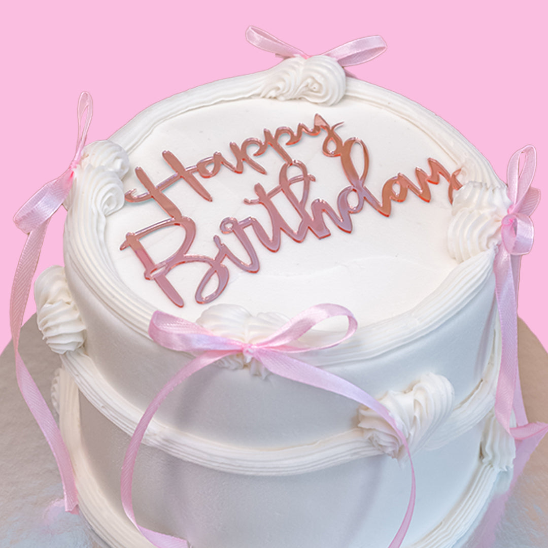 White & Pink Ribbons Cake