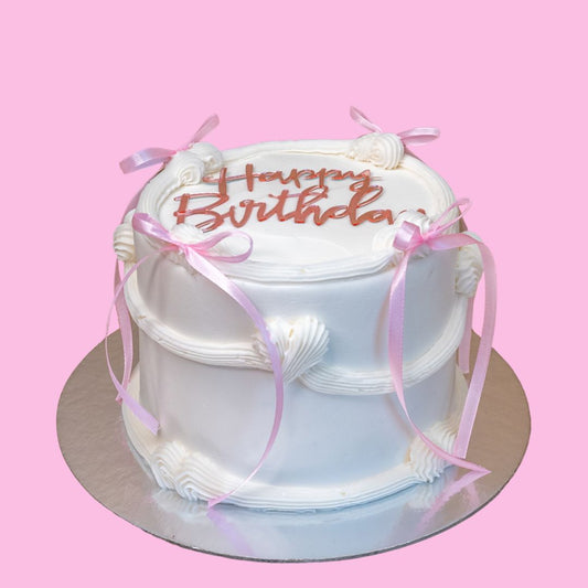 White & Pink Ribbons Cake